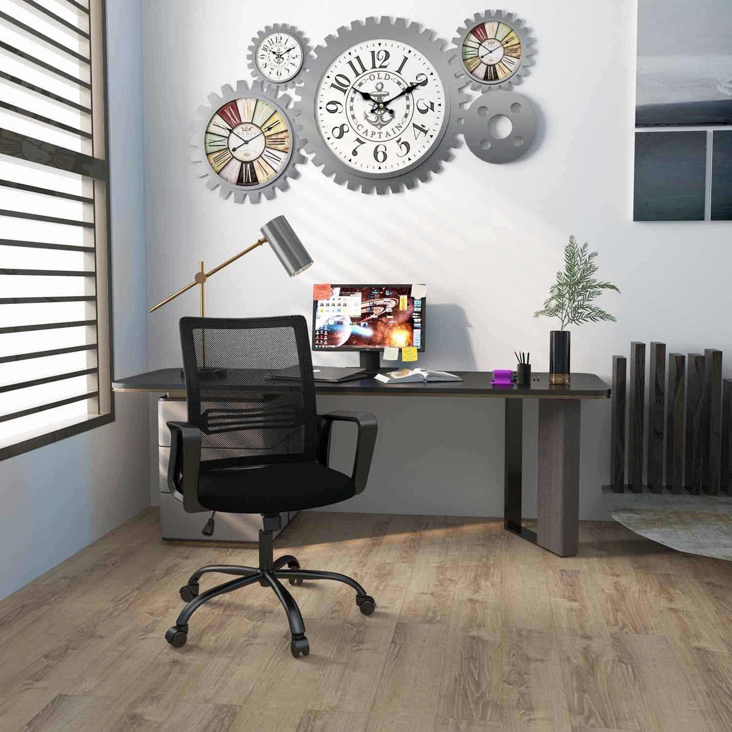 Black Ergonomic Mesh Office Chair With Armrests And Wheels