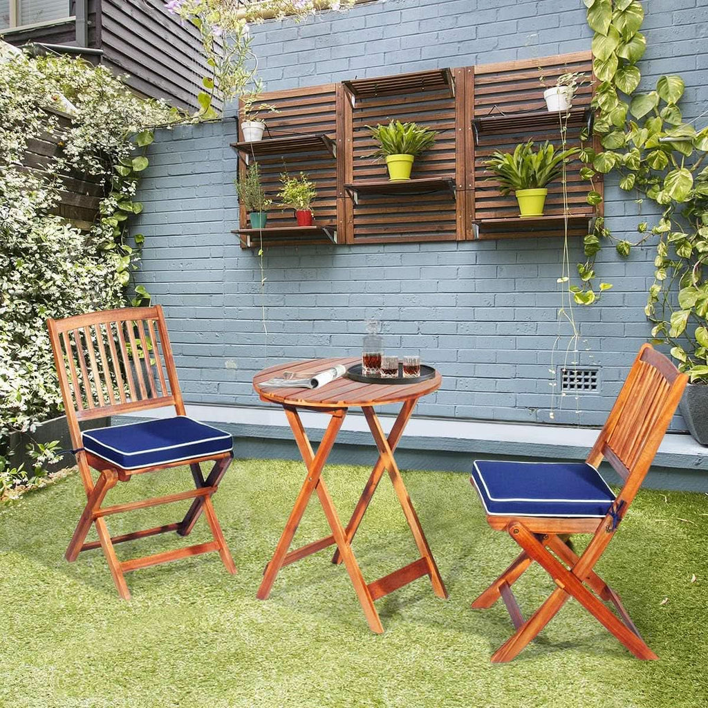 Patio Bistro Set With Wood Table And Navy Cushioned Chairs